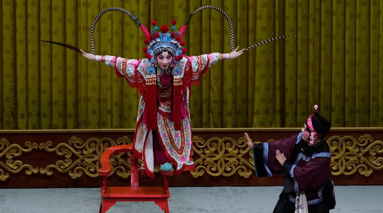 Peking Opera actress Zhang Wanting performs during a show at Jixiang Theatre in Beijing, China, Sunday, Sept. 7, 2025. (AP Photo/Mahesh Kumar A.)