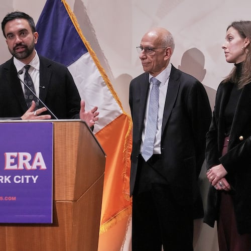 CORRECTS NAME SPELLING: New York Mayor-elect Zohran Mamdani, left, announces the appointment of Dean Fuleihan, center, as first deputy mayor and Elle Bisgaard-Church as chief of staff, in New York, Monday, Nov. 10, 2025. (AP Photo/Richard Drew)