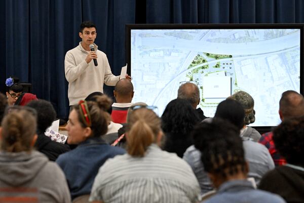 Andrew Alves, Digital Realty's senior vice president of acquisitions, speaks during a town hall by NPU-V and Digital Realty to discuss a planned data center in Atlanta at Dunbar Elementary School, Thursday, March 19, 2026, in Atlanta. (Hyosub Shin/AJC)
