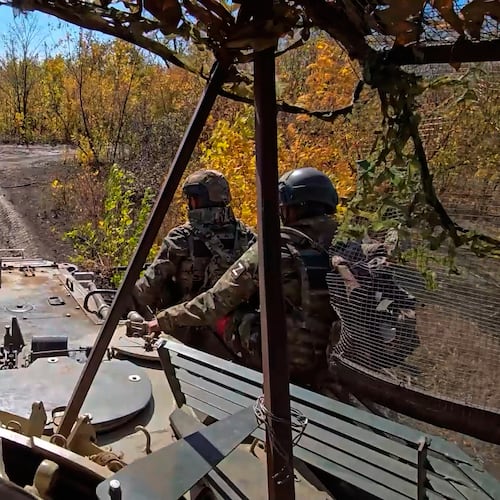In this image made from video provided by the Russian Defense Ministry Press Service on Friday, Oct. 31, 2025, Russian servicemen attend a practice for sabotage operations behind enemy lines at a training ground on an undisclosed location. (Russian Defense Ministry Press Service via AP)