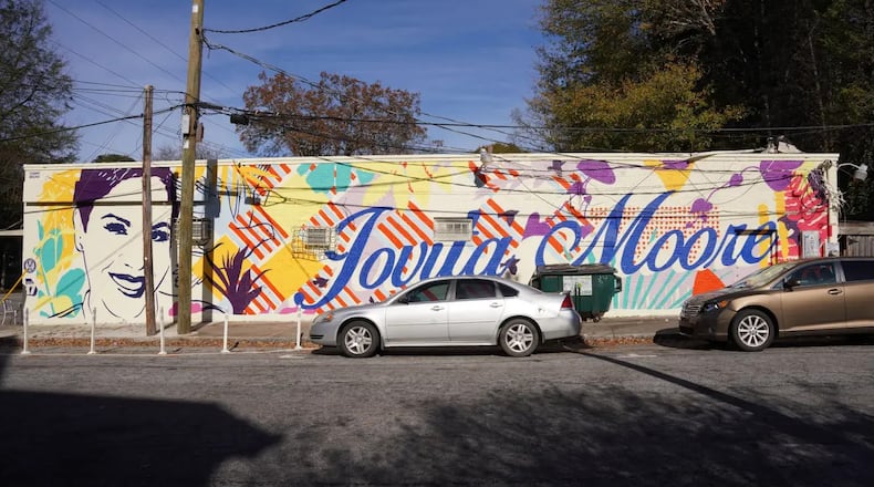 The owners of Bellwood Coffee issued an apology on Friday after painting over a mural of the late news anchor, Jovita Moore. The tribute mural, painted in 2021 by local artist Tommy Bronx just weeks after Moore’s death, was part of a nine-mural series commissioned by Atlanta United Soccer to honor local trailblazers. (Courtesy of Atlanta United Soccer)