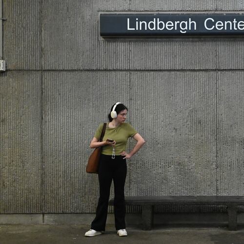 A MARTA rider waits at the Lindbergh Center station for a Gold Line/Red Line train in September 2025. MARTA has recommended Lindbergh Center as the Clifton Corridor endpoint, rather than Armour Yards. (Hyosub Shin/AJC 2025)