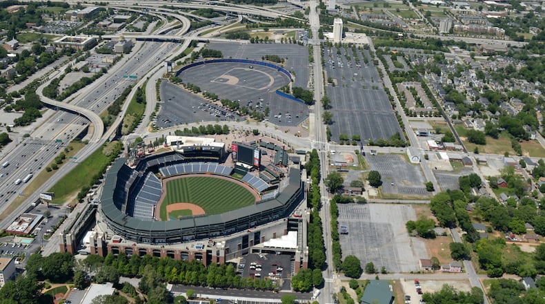 Aerials of Turner Field May 7, 2014. Georgia State University and a prominent Atlanta development team want to acquire Turner Field and the sea of parking lots between it and downtown to create a new southern campus for the college and a $300 million mixed-use development that would transform an area threatened by the Braves’ pending departure to Cobb County. The university wants to convert The Ted into a new 30,000-seat football, soccer and track-and-field stadium and build a new baseball park, academic buildings and green space.