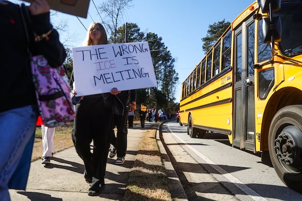Brookwood High School students rally against Immigration and Customs Enforcement in Snellville on Wednesday, Jan. 28, 2026. In Georgia, hundreds of students have walked out of school to protest immigration crackdowns under the Trump administration. (Abbey Cutrer/AJC)