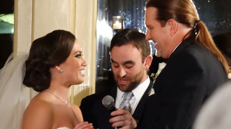Amanda and Steve Rickman moments before they were officially married at Country Club of the South Saturday, January 25, 2014. CREDIT: Rodney Ho/rho@ajc.com