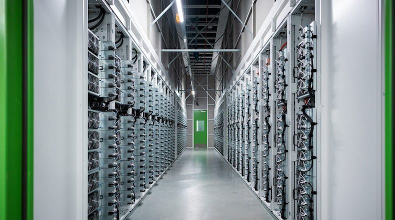 This is a file photo of computer server racks inside a Microsoft data center. (Courtesy Microsoft)