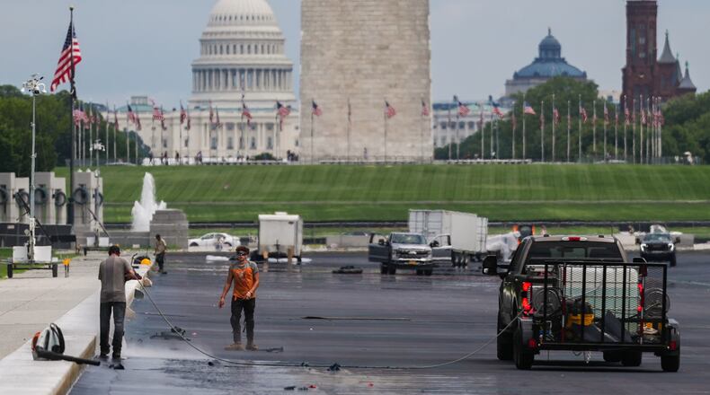 Work continues on the Lincoln Memorial Reflecting Pool, Tuesday, Aug. 18, 2026, in Washington. (AP Photo/Julia Demaree Nikhinson)