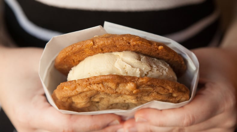 This beautiful ice cream sandwich at Butter & Cream in Decatur is made with two Brown Sugar Almond cookies and Salted Butterscotch ice cream (styling by Sally Williams and Henryk Kumar) (Photography by Renee Brock/Special)