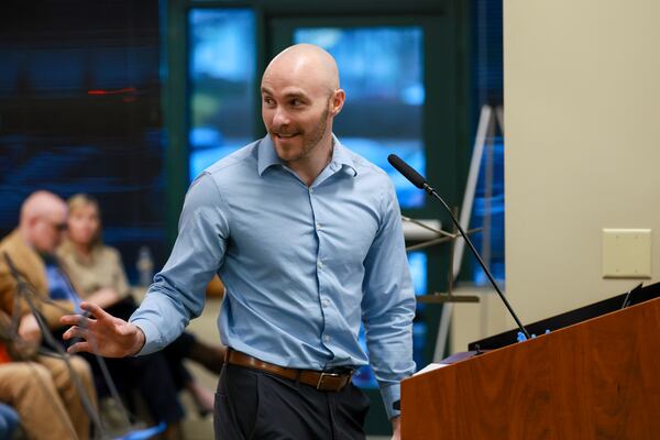 Dunwoody resident Jason Hunyar speaks to the Dunwoody’s City Council during a public portion of their meeting at Dunwoody City Hall, Monday, Feb. 23, 2026, in Dunwoody. Hunyar spoke in opposition of the City potentially using Flock, a license plate reader company. (Jason Getz/AJC)