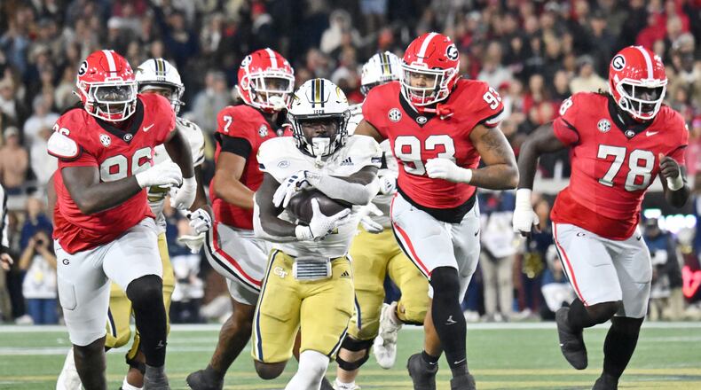 Georgia Tech running back Jamal Haynes (11) runs for a long first down during the second half of an NCAA college football game at Georgia Tech's Bobby Dodd Stadium, Saturday, November 25, 2023, in Atlanta. Georgia won 31-23 over Georgia Tech. (Hyosub Shin / Hyosub.Shin@ajc.com)