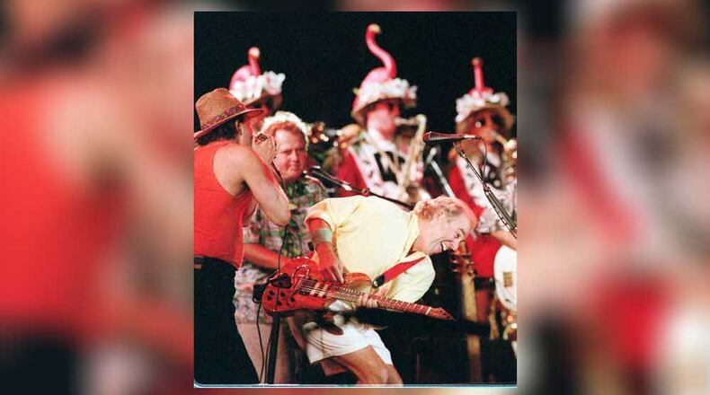 Jimmy Buffett with his parrotheads ham it up at the Lakewood Amphitheater
