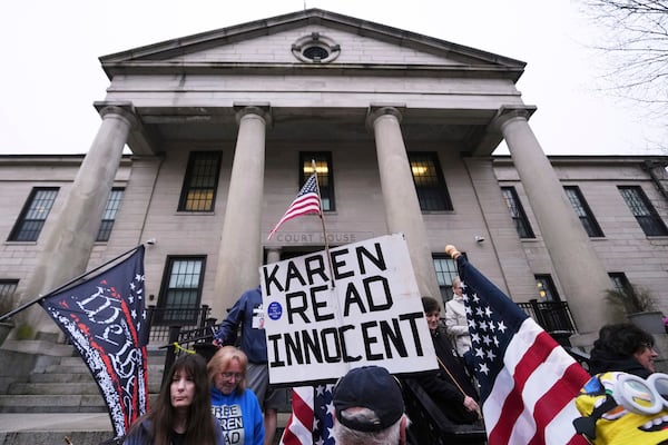 Supporters of Karen Read gather on the steps at Norfolk Superior Court prior to Read's trial, Tuesday, April 22, 2025, in Dedham, Mass. (AP Photo/Charles Krupa)