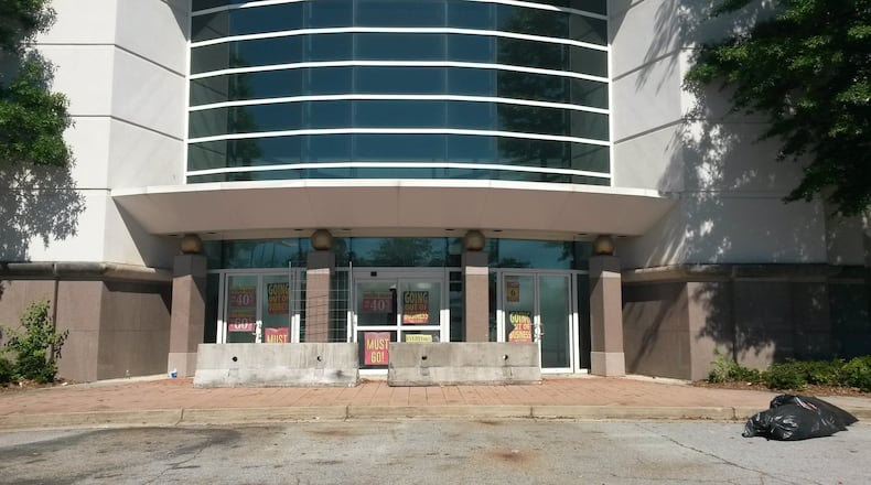 The former Belk department store is just one of the shuttered spaces at Gwinnett Place. The Duluth mall has fallen on hard times, but the mall owner’s plans for redevelopment are up in the air. MATT KEMPNER / AJC