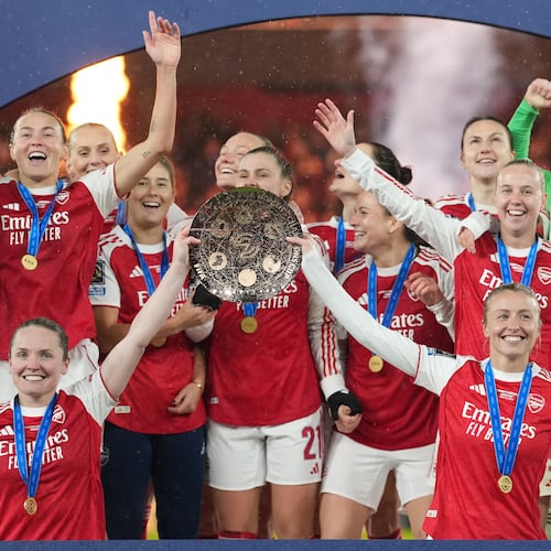 FILE - Arsenal's team captains Kin Little, left, and Leah Williamson, right, lift the trophy after winning the Women's Champions Cup final soccer match between Arsenal FC and SC Corinthians in London, Sunday, Feb. 1, 2026. (AP Photo/Alastair Grant, File)