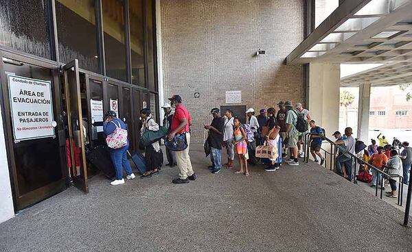 Hundreds of local residents wait in line outside the Savannah Civic Center to get a free transportation to inland shelters under mandatory evacuation ahead of Hurricane Dorian on Tuesday, September 3, 2019. Chatham Area Transit (CAT) provided free transportation to residents without private transportation to the Savannah Civic Center to assist in the mandatory evacuation of Chatham County. 