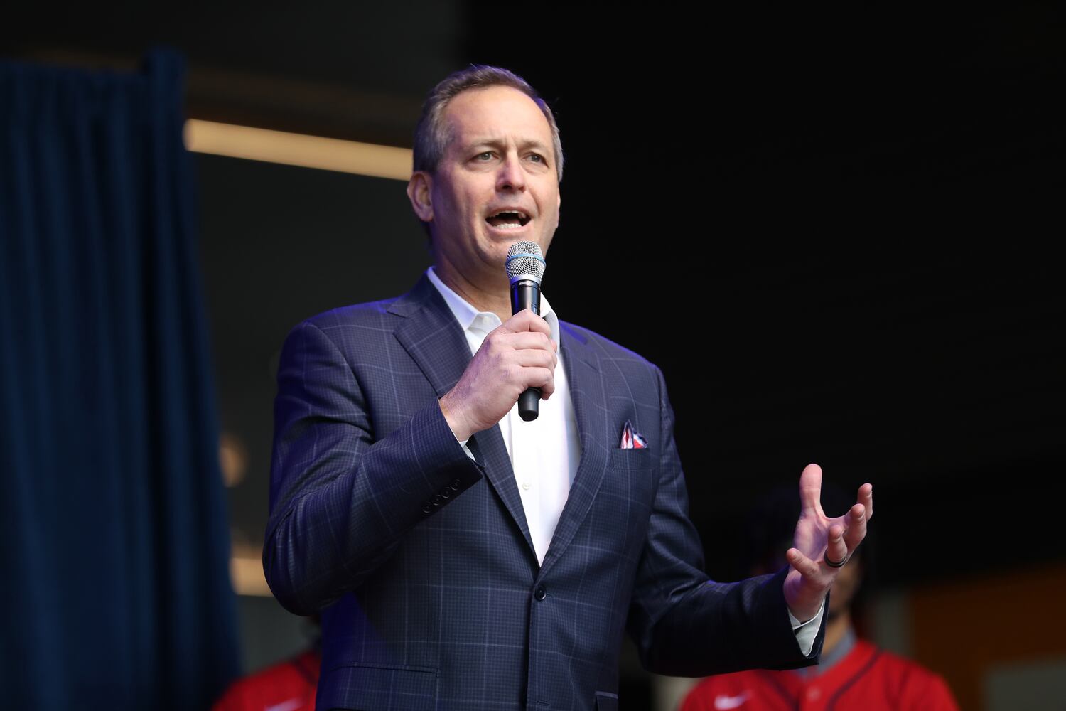 Braves President and CEO Derek Schiller speaks to the crowd. Miguel Martinez for The Atlanta Journal-Constitution 