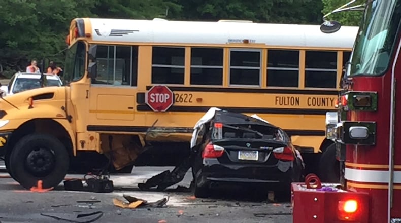 Two people are dead after a crash involving a special-needs school bus in Roswell. (Credit: Channel 2 Action News)