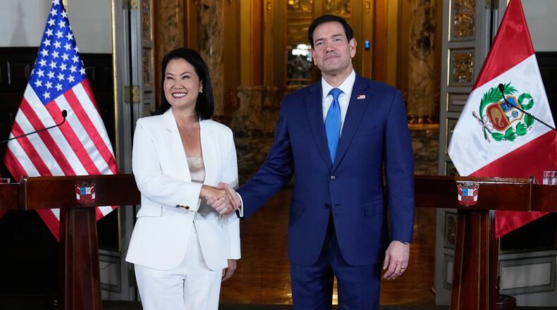 U.S. Secretary of State Marco Rubio, right, and Peruvian President Keiko Fujimori shake hands after a joint news conference at the presidential palace in Lima, Peru, Thursday, Sept. 10, 2026. (AP Photo/Martin Mejia, Pool)