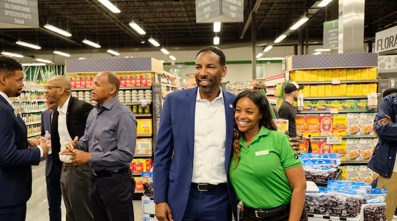 Atlanta Mayor Andre Dickens posed with a Publix employee inside the newly opened grocery store in Summerhill on June 21, 2023.