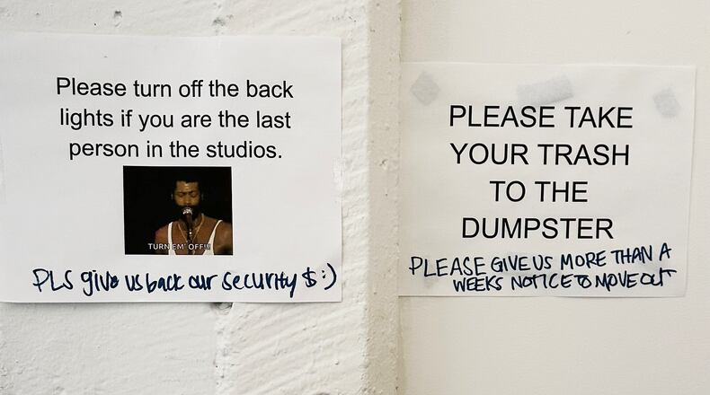 Marked-up signage found inside Mint reflect studio artists' distress at the sudden closing of the facilities.