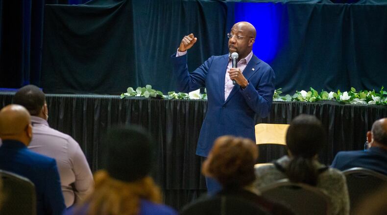 U.S. Sen. Raphael Warnock speaks Friday during a town hall meeting at the Maloof Auditorium in Decatur. STEVE SCHAEFER FOR THE ATLANTA JOURNAL-CONSTITUTION