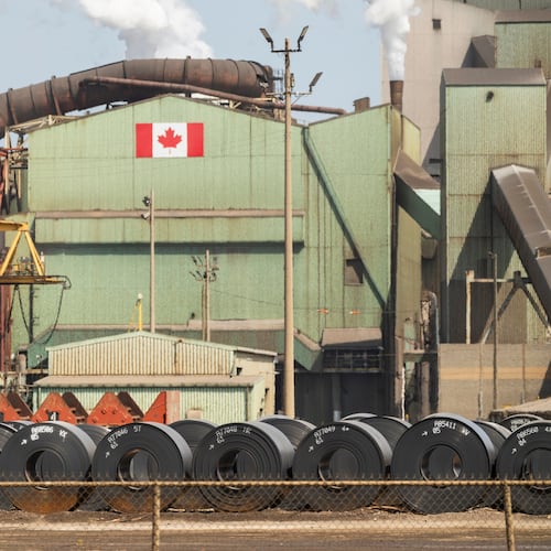 Rolled coils of steel sit in the yard at the ArcelorMittal Dofasco steel plant in Hamilton, Ont. on Thursday, Aug. 20, 2026. (Nick Iwanyshyn /The Canadian Press via AP)