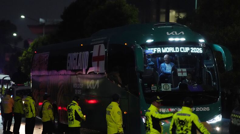 The England team bus arrives at a hotel in Mexico City ahead of England's World Cup round of 16 soccer match against Mexico, Friday, July 3, 2026. (AP Photo/Eduardo Verdugo)