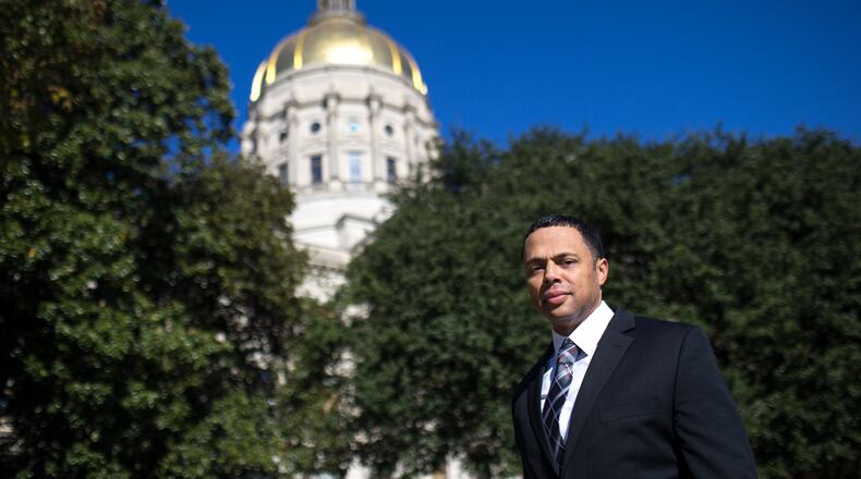Michael McNeely poses for a portrait outside of the state Capitol, Wednesday, Nov. 16, 2016, in Atlanta.  McNeely is one of 16 GOP electors under pressure to change their vote following Donald Trump's surprise victory.   BRANDEN CAMP/SPECIAL