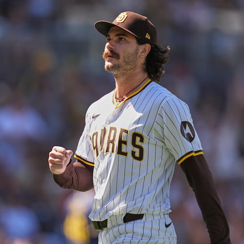 FILE - San Diego Padres starting pitcher Dylan Cease celebrates after the third out during the third inning of a baseball game against the Milwaukee Brewers, Sept. 24, 2025, in San Diego. (AP Photo/Gregory Bull, File)