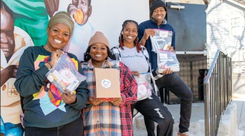 LaTonya Gates (left) started an after-school program called PAWkids for children in Atlanta’s Westside. “Poverty is a mindset that we are working with these children to overcome,” she said. “This isn’t a babysitting club. The children who come here want to work to be better.” (Courtesy of Isadora Pennington)