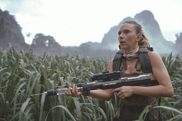 This image released by Universal Pictures and Amblin Entertainment shows Scarlett Johansson in a scene from " Jurassic World: Rebirth." (Jasin Boland/Universal Pictures and Amblin Entertainment via AP)