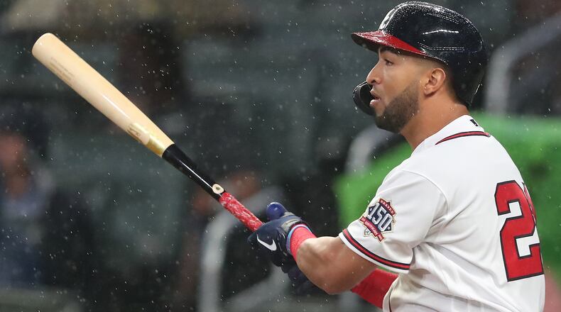 Braves outfielder Eddie Rosario rips a RBI single to take a 1-0 lead over the Colorado Rockies during the second inning Wednesday, Sept. 15, 2021, at Truist Park in Atlanta. Rosario, a Puerto Rico native, wore No. 21 Wednesday in honor of Hall of Famer Roberto Clemente. (Curtis Compton / Curtis.Compton@ajc.com)