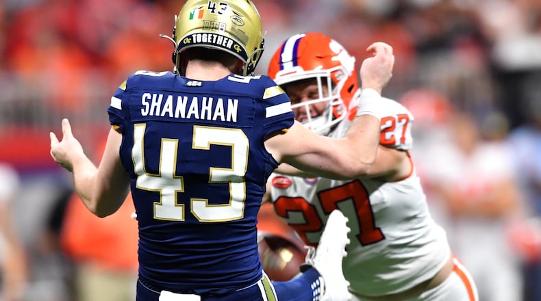 Clemson's Carson Donnelly blocks a punt by Georgia Tech's David Shanahan during the first half of a Chick-fil-A Kickoff game on Monday night at Mercedes-Benz Stadium. (Hyosub Shin / Hyosub.Shin@ajc.com)