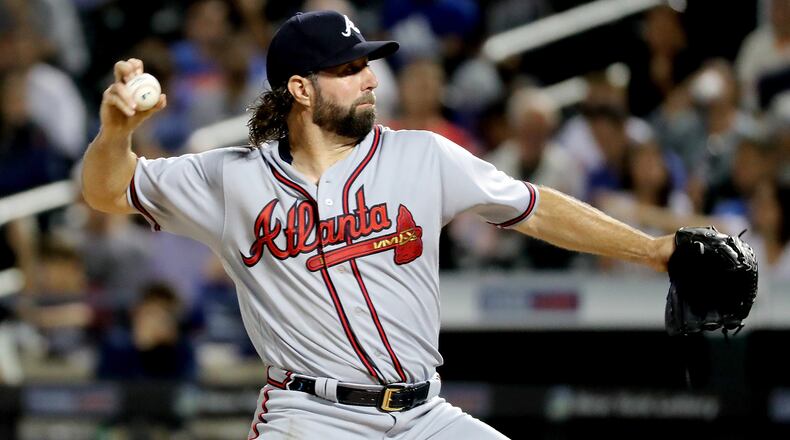 NEW YORK, NY - SEPTEMBER 26: R.A. Dickey #19 of the Atlanta Braves pitches during the first inning against the New York Mets on September 26, 2017 at Citi Field in Flushing neighborhood of the Queens borough of New York City. (Photo by Abbie Parr/Getty Images)