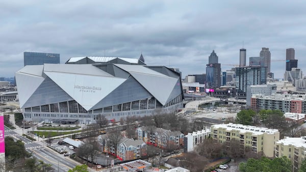 An aerial image shows property south of Mercedes-Benz Stadium where a new mixed-use project is being considered. (Miguel Martinez/ AJC)