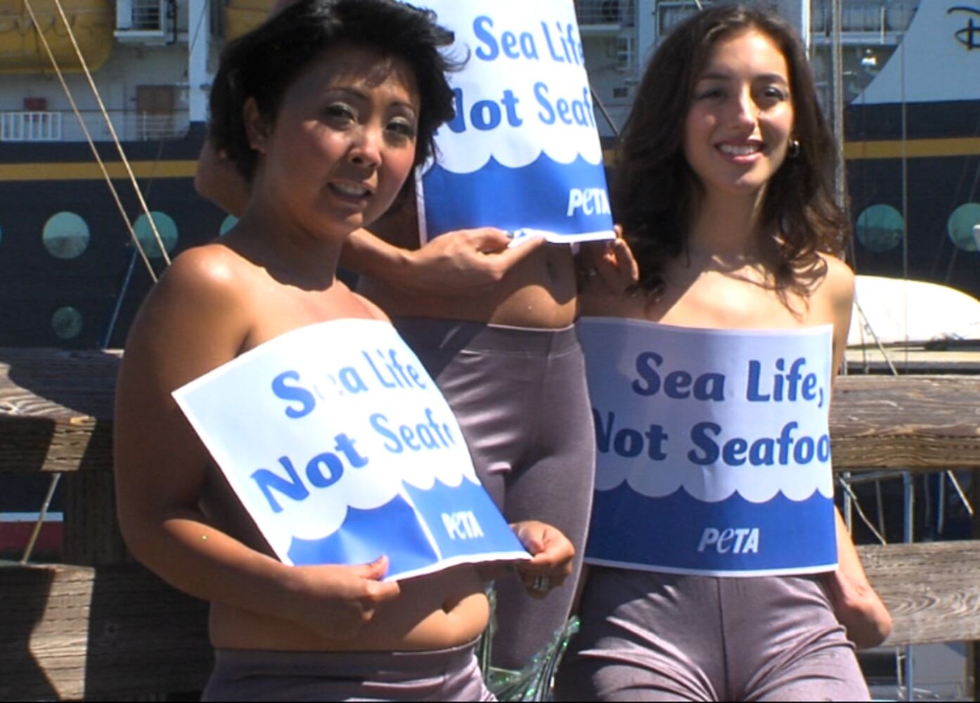 PETA and topless mermaids against seafood