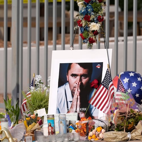 FILE - A makeshift memorial grows in size at the Turning Point USA headquarters after the shooting death at a Utah college of Charlie Kirk, the 31-year-old founder and CEO of the organization, Sept. 17, 2025, in Phoenix. (AP Photo/Ross D. Franklin, File)