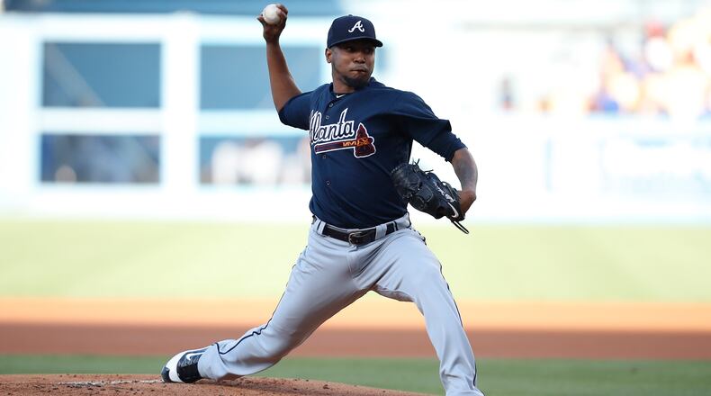 Atlanta Braves starting pitcher Julio Teheran pitches against the Los Angeles Dodgers during the first inning of a baseball game, Saturday, July 22, 2017, in Los Angeles. (AP Photo/Ryan Kang)