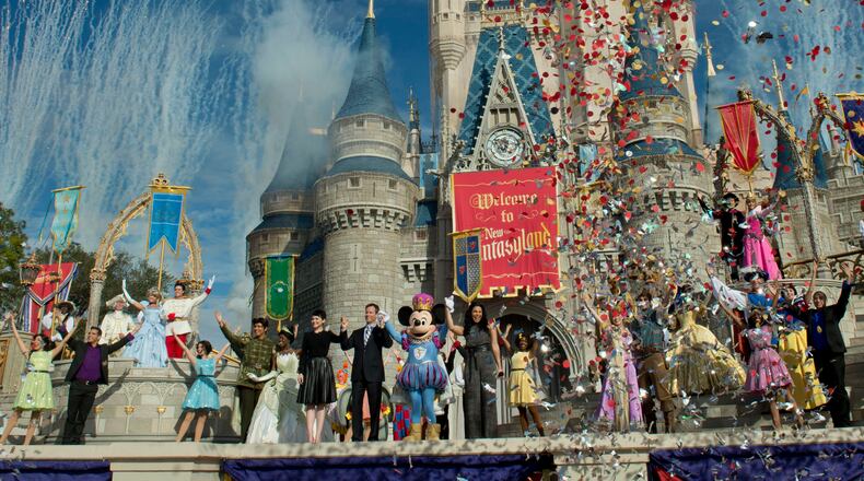 LAKE BUENA VISTA, FL - DECEMBER 06: In this handout image provided by Disney Parks, fireworks and confetti fly at Cinderella Castle during the Grand Opening of New Fantasyland at Walt Disney World Resort December 6, 2012 in Lake Buena Vista, Florida. Actress Ginnifer Goodwin, Disney Parks and Resorts Chairman Tom Staggs, singer Jordin Sparks and Mickey Mouse joined dozens of Disney characters on Cinderella Castle stage to celebrate the opening. New Fantasyland is a new area in the Magic Kingdom and is the largest expansion in the 41-year history of the theme park. (Photo by Kent Phillips/Disney Parks via Getty Images)
