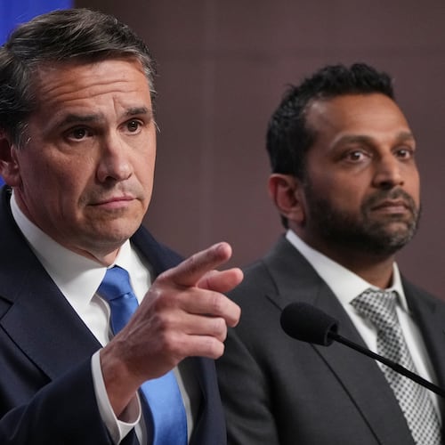 Acting Attorney General Todd Blanche speaks as FBI Director Kash Patel listens during a news conference at the Justice Department, Tuesday, April 21, 2026, in Washington. (AP Photo/Jacquelyn Martin)