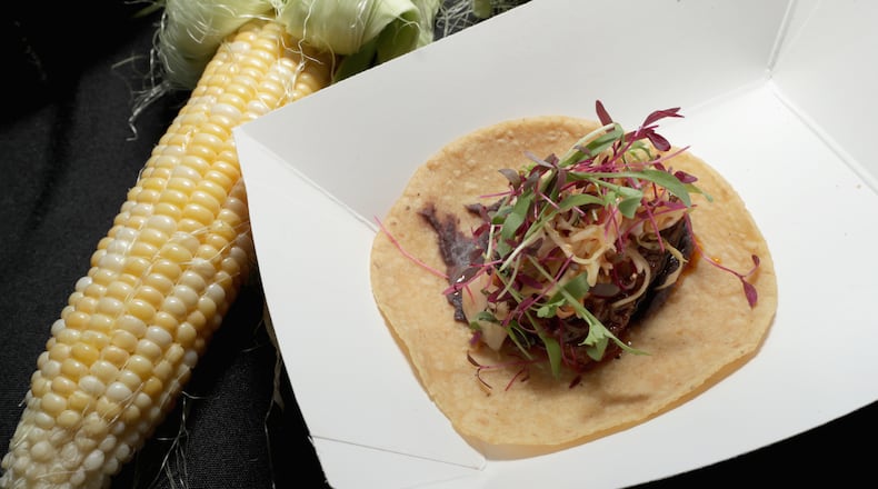 Houston police say a woman shot her boyfriend over a cold taco.