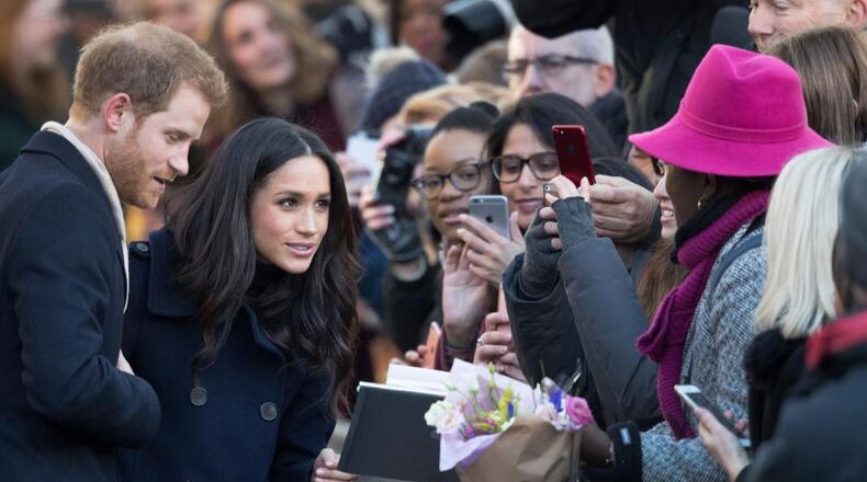 NOTTINGHAM, ENGLAND - DECEMBER 01:  Prince Harry and fiancee Meghan Markle arrive at the Terrance Higgins Trust World AIDS Day charity fair at Nottingham Contemporary on December 1, 2017 in Nottingham, England. Prince Harry and Meghan Markle announced their engagement on Monday 27th November 2017 and will marry at St George's Chapel, Windsor Castle in May 2018.  (Photo by Christopher Furlong/Getty Images)