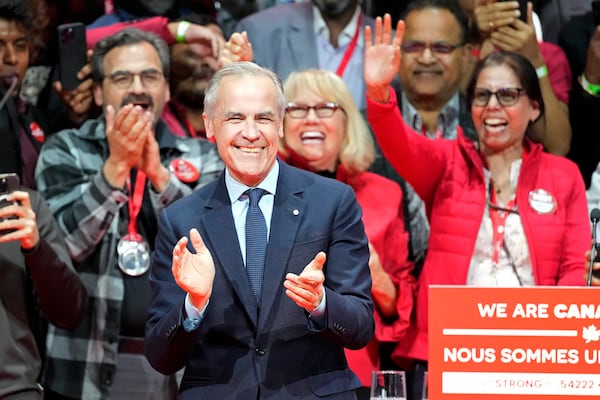 Canadian Prime Minister Mark Carney smiles on stage at his campaign headquarters after the Liberal Party won the Canadian election in Ottawa, Ontario, Tuesday, April 29, 2025. (Frank Gunn/The Canadian Press via AP)