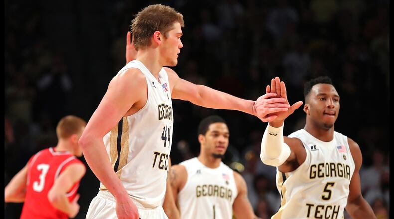 Georgia Tech center Ben Lammers and freshman guard Josh Okogie, here celebrating after a basket against Belmont in the NIT, both will return to the Jackets next season. (Curtis Compton/ccompton@ajc.com)