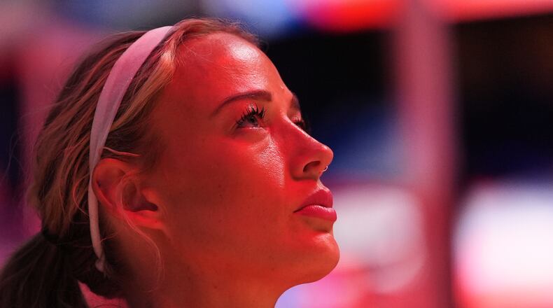 Indiana Fever guard Sophie Cunningham looks on during the national anthem before facing the Seattle Storm a WNBA basketball game, Tuesday, July 28, 2026, in Seattle. (AP Photo/Lindsey Wasson)
