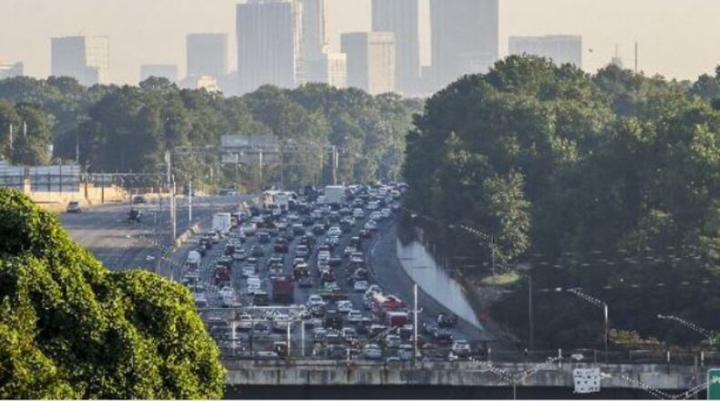 Drivers could face daunting traffic heading into downtown Atlanta on Saturday. JOHN SPINK / JSPINK@AJC.COM