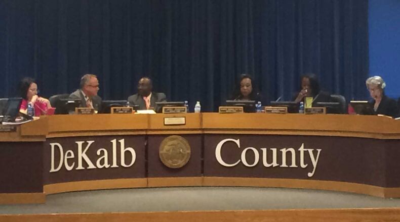 The DeKalb County Board of Commissioners voted Tuesday to scheduled three meetings a year in the evening and outside of Decatur. From left: Commissioners Nancy Jester, Jeff Rader, Larry Johnson, Sharon Barnes Sutton, Mereda Johnson and Kathie Gannon. MARK NIESSE / MARK.NIESSE@AJC.COM