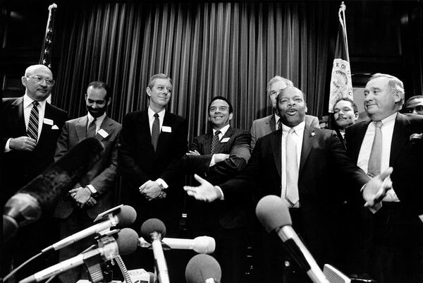 One of Mayor Young's biggest moments was hosting the 1988 Democratic National Convention. The event put the city in the international spotlight, with Young beaming at the center of it. Here, Georgia Democrats, including U.S. Rep John Lewis (front right), announce the location of the convention to the media in 1987. (Louie Favorite / AJC Archive at GSU Library AJCP177-012a)