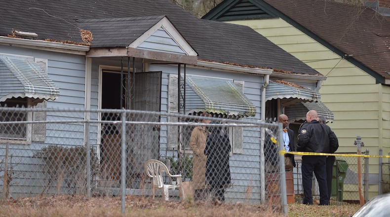 A woman was found dead in the 1700 block of Madrona Street NW on Friday afternoon, Atlanta police said. Another body was found in the evening. BRANT SANDERLIN / BSANDERLIN@AJC.COM