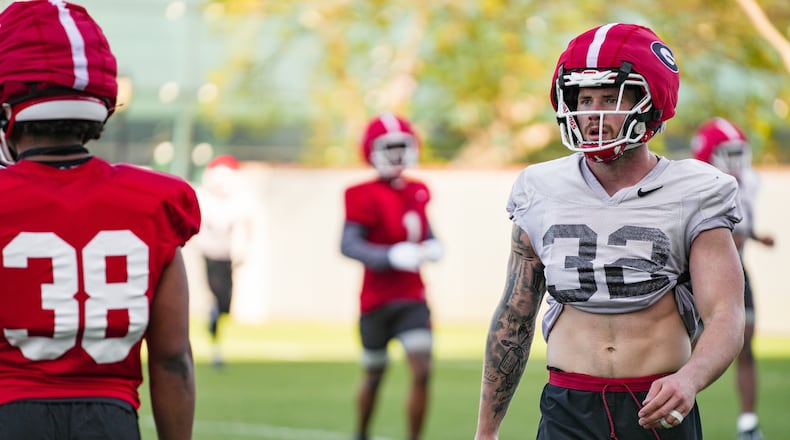 Georgia outside linebacker Chaz Chambliss (32), pictured here during a recent spring football practice session in Athens, is giving serious consideration to a career after football as an MMA fighter. (Tony Walsh/UGA Athletic Association)